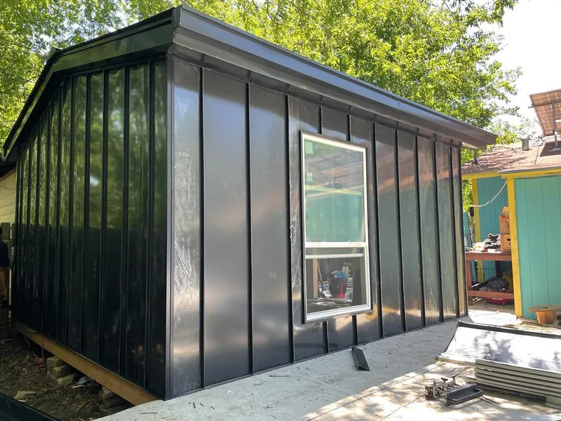 Black standing seam metal wall panels for Metal Roof Installation in Lockhart