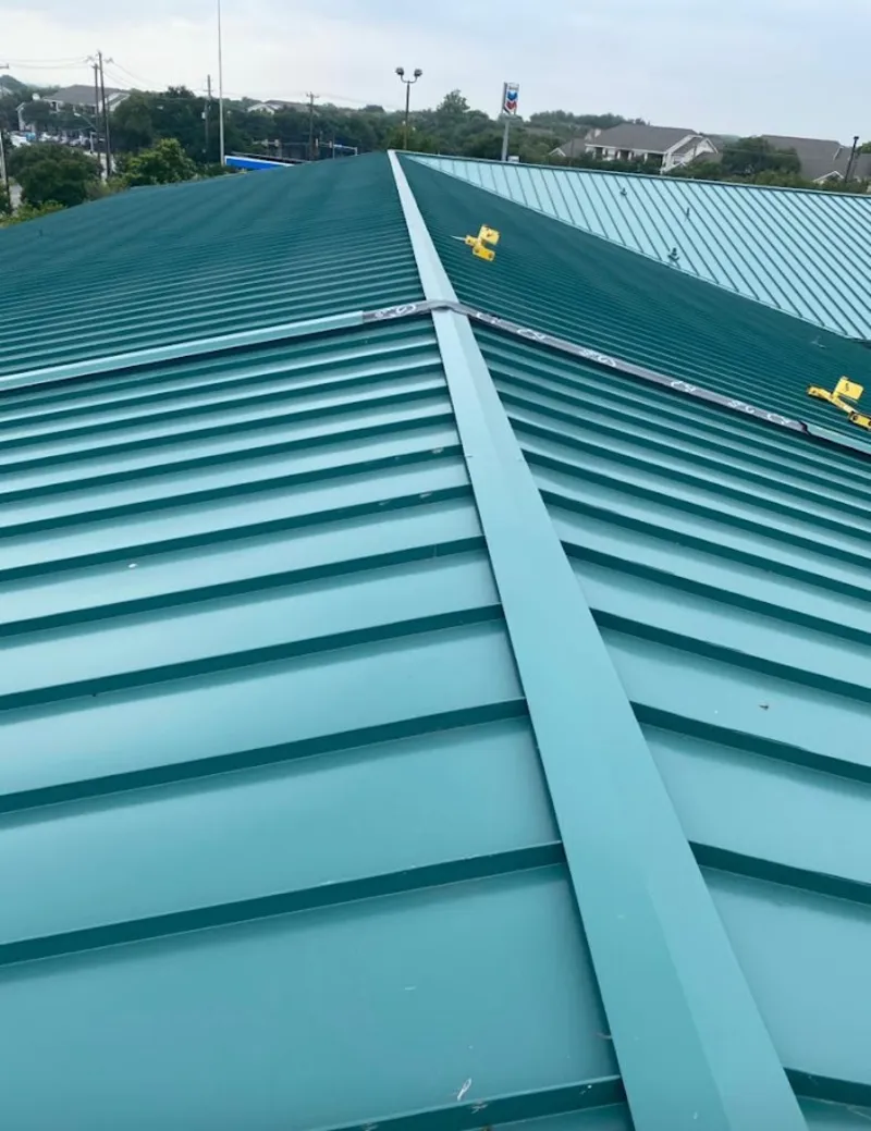 Green commercial metal roof ridge and valley for Metal Roof Repair in Lockhart